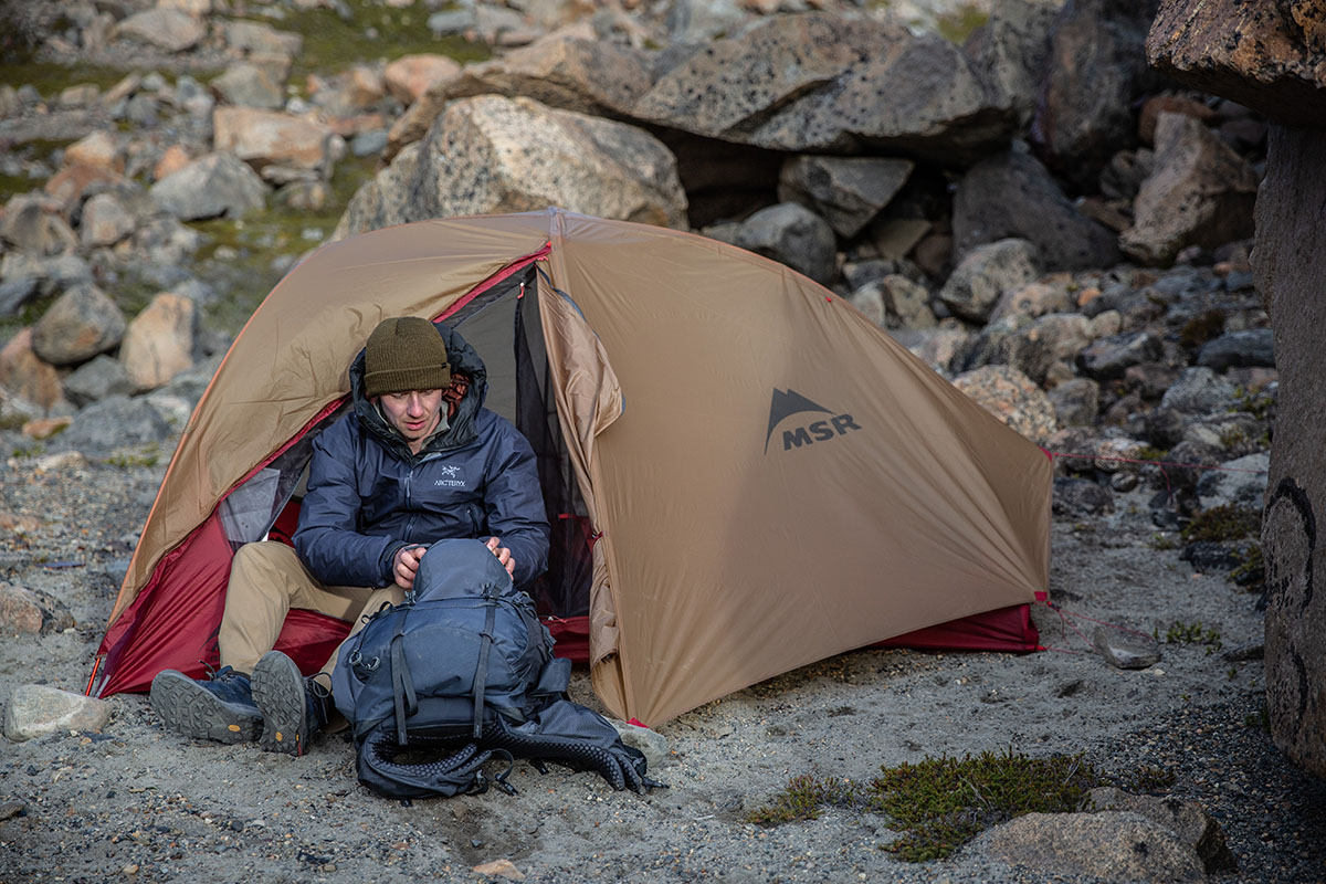 ​​MSR FreeLite 2 backpacking tent (reaching into backpack)